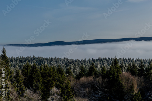 Winterspaziergang an einem sonnigen kalten Wintertag rund um die Eberstwiese auf dem Rennsteig - Thüringen/Deutschland photo