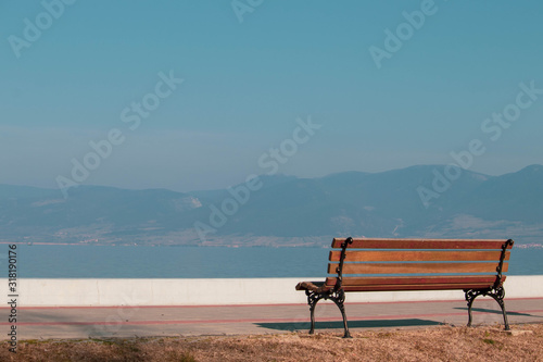 Bench in the park. Bench facing River and Mountain. Bench with beautiful look. 