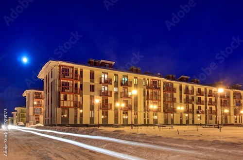 Typical architecture of village suburb of Solnechnogorsky District, Moscow region, Russia. Small modern colorful city in autumn rainy evening. Four-storey multi-panel apartment house. four floor house photo