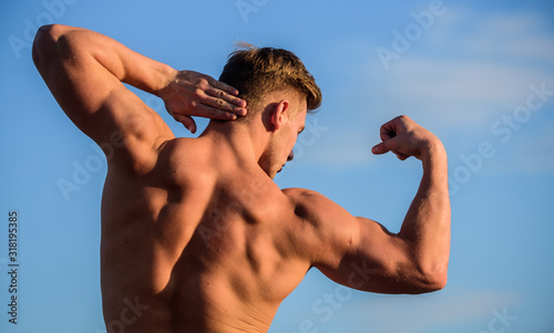 Bigger muscles grow. Increase overall muscle mass. Man muscular chest naked torso sky background. Man muscular athlete bodybuilder show muscles. Bodybuilder shape. Sexy body. Triumph and loss