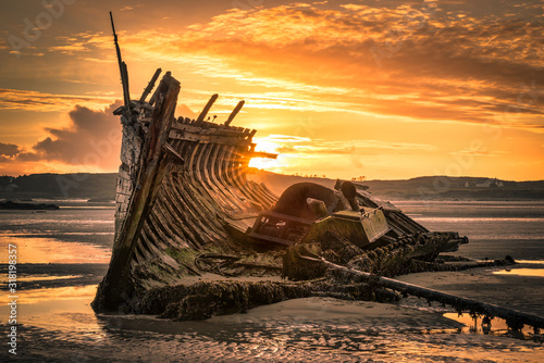 Old Ship Wreck at Sunset photo