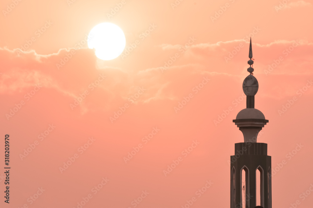 silhouette of a mosque at sunset