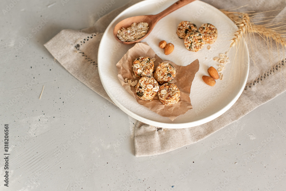 Raw vegan healthy dessert, date and nuts bliss balls, ingredients. Top view, space for text. Raw vegan healthy dessert, date and nuts bliss balls, ingredients. Top view, space for text.
