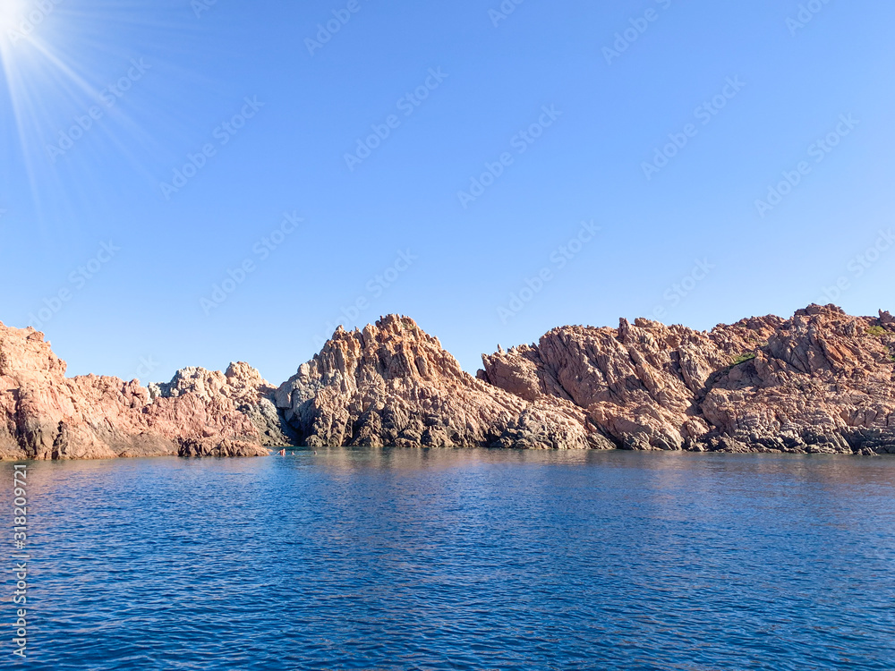 Rocky coast and crystal clear sea, Sardinia, view from boat
