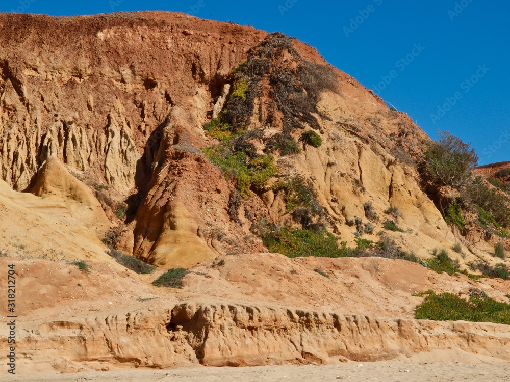 Fototapeta premium Beautiful beach Praia da Oura in Albufeira at the blue Atlantic ocean