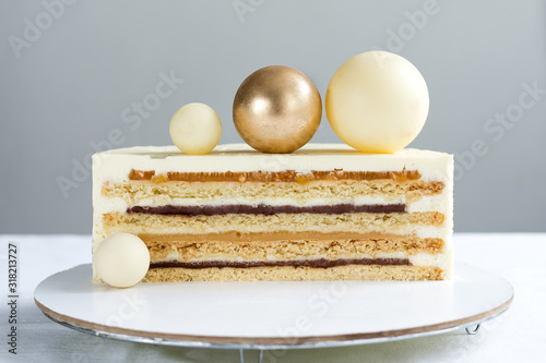 Cake for a holiday with chocolate Golden balls