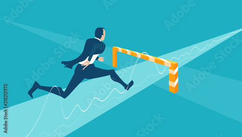 Tableau sur toile Business man running and jumping over hurdles towards success