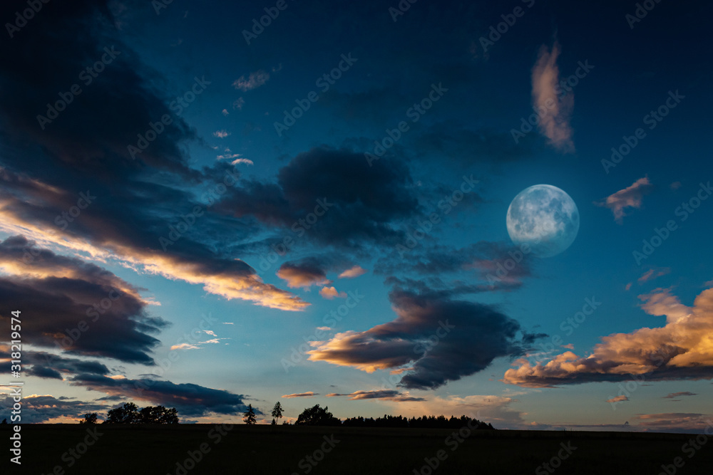 Night Landscape with Moon on Dark Blue Sky with Clouds