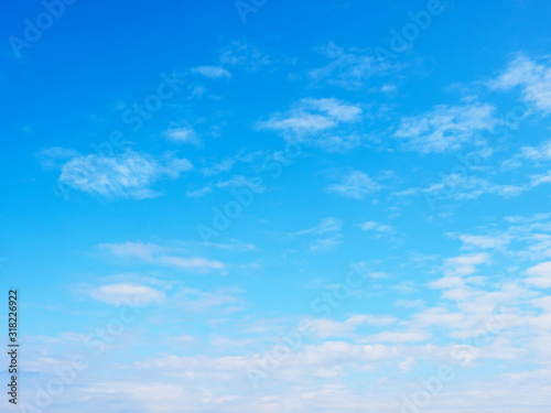 Fototapeta Naklejka Na Ścianę i Meble -  White clouds on a blue sky background