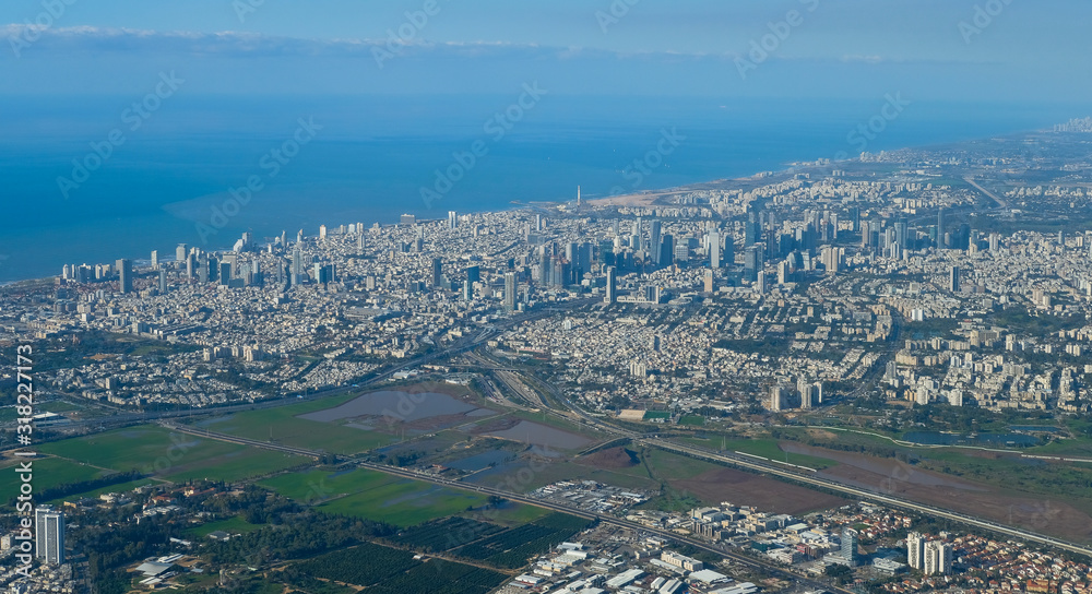 Fototapeta premium Panorama of the city center of Tel Aviv - Yafo taken from the air, aerial shot of the modern economic and technical center of Israel