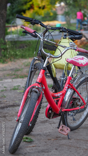 Parked bike near the Playground. Environmentally friendly mode of transport is parked at the Playground © Yevhen