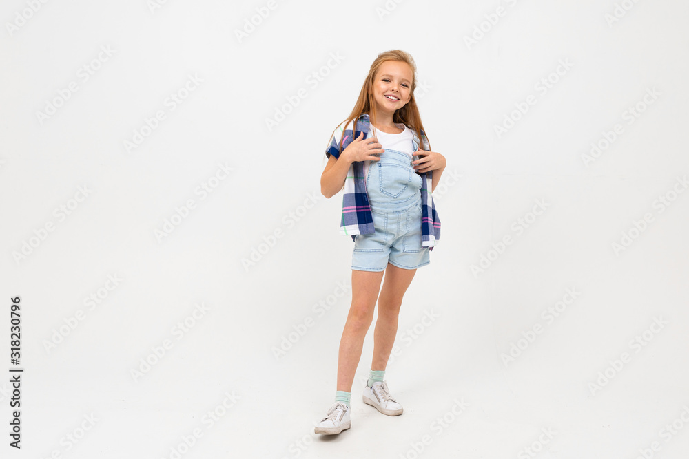 Beautiful teenager girl with long hair in stylish clothes dances and enjoy of her life Beautiful teenager girl with long hair in stylish clothes dances and enjoy of her life