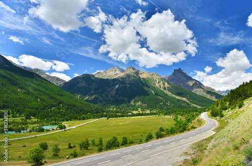 View of a road in summer mountains