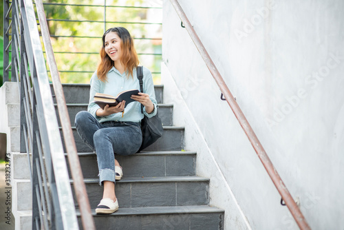 Happy young Asian University student.