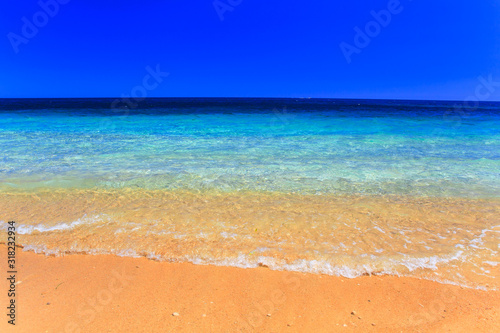 Sea beach blue sky sand sun daylight relaxation landscape viewpoint for design postcard and calendar in Spain