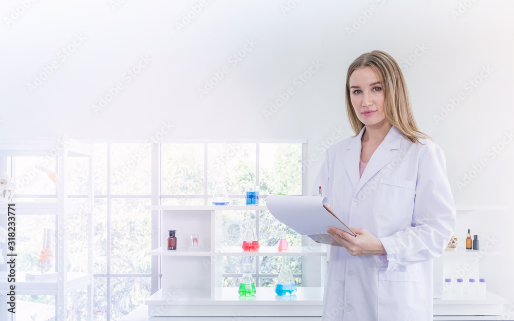 pretty scientist work reserching in a chemical laboratory pretty scientist work reserching in a chemical laboratory