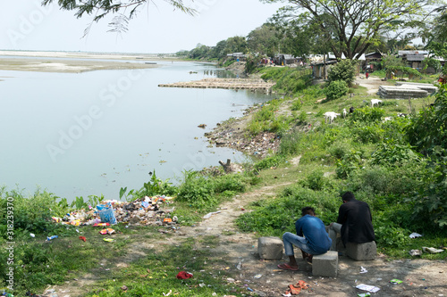 Village life at Brahmaputra river bank, Assam photo