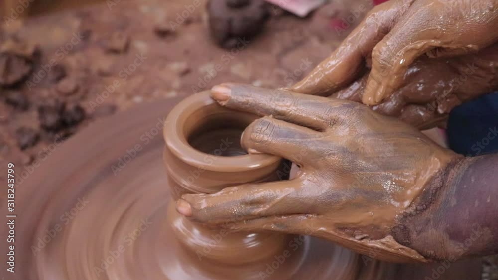 Hands And Fingers Posture Of Potter Making Pottery From Mud Using Spinning Potter Wheel Hands And Fingers Posture Of Potter Making Pottery From Mud Using Spinning Potter Wheel