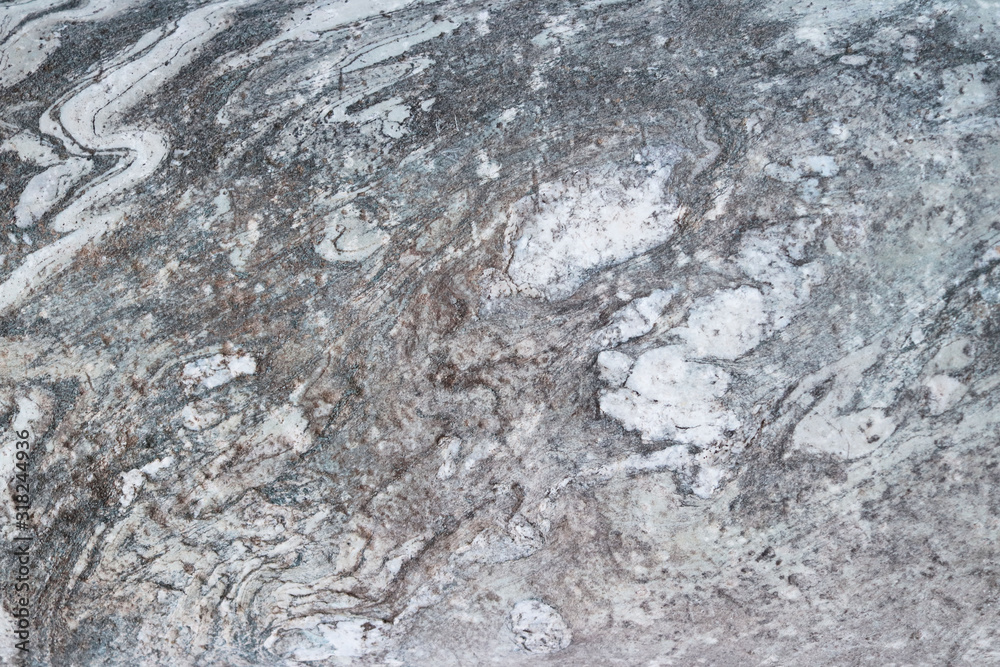 Naklejka premium The plate is made of marble in black and white shades. Smooth texture for design and decoration. Natural building material. Natural patterns on the stone. Plates for floor and walls