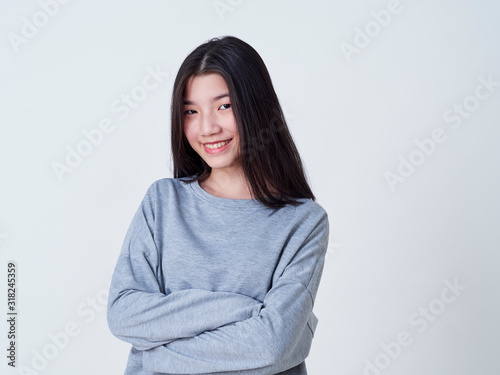 Smiling young woman over white background