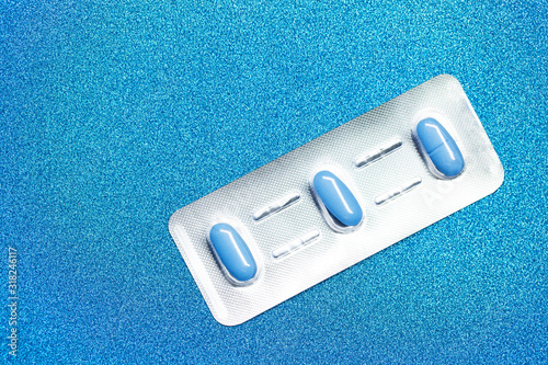 Bild auf Leinwand Pill for men's health and Valentine day background.