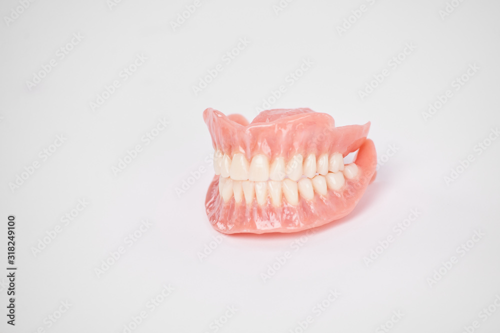 Dentures. Full removable denture. Isolate on white background Dentures. Full removable denture. Isolate on white background