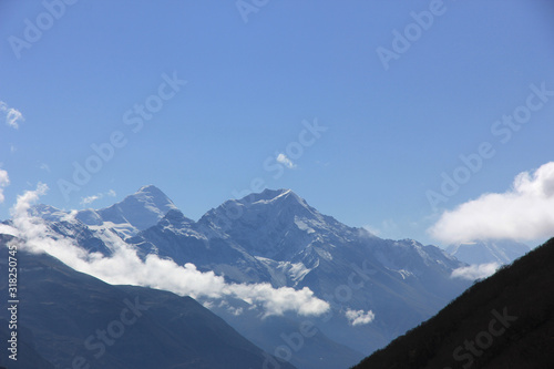 Snowy mountains against the blue sky. Mountains of Nepal