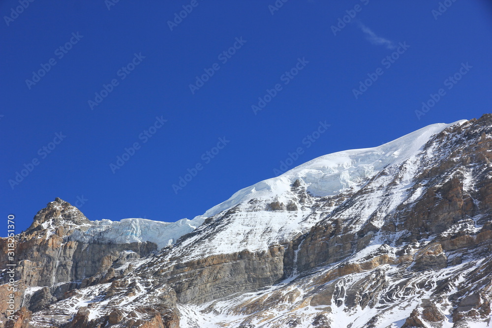 Snowy mountains against the blue sky. Mountains of Nepal Snowy mountains against the blue sky. Mountains of Nepal
