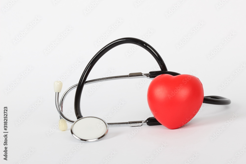 Stethoscope and heart isolated on white Stethoscope and heart isolated on white