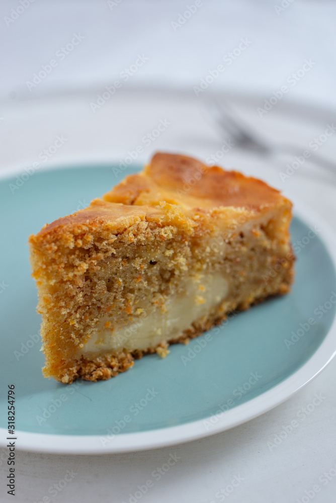 home made carrot cake cheesecake on a table home made carrot cake cheesecake on a table