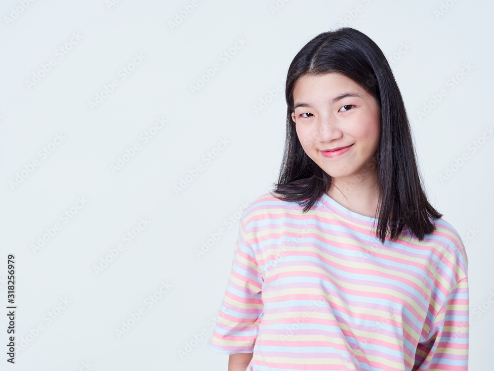 Smiling young woman over white background Smiling young woman over white background