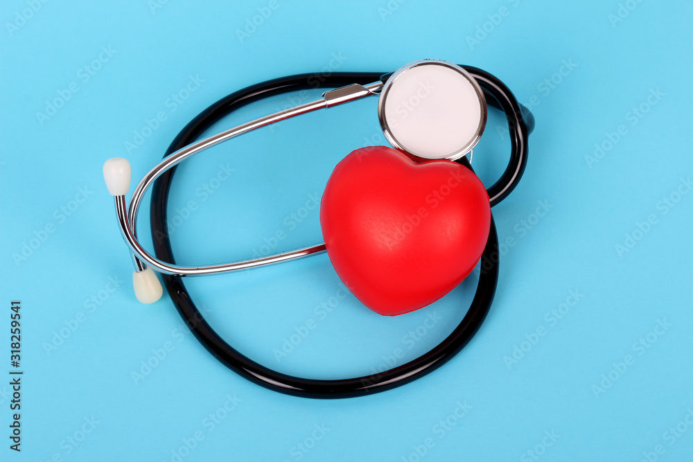 stethoscope and heart isolated on blue background stethoscope and heart isolated on blue background