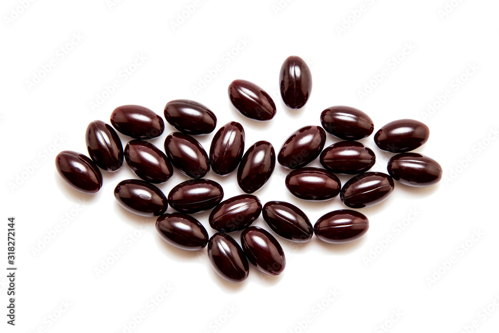 Chocolates in chocolate glaze isolated on white Chocolates in chocolate glaze isolated on white