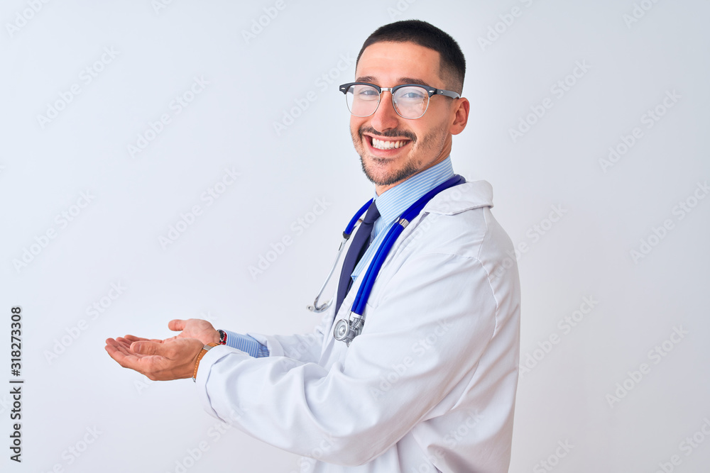 Young doctor man wearing stethoscope over isolated background pointing aside with hands open palms showing copy space, presenting advertisement smiling excited happy Young doctor man wearing stethoscope over isolated background pointing aside with hands open palms showing copy space, presenting advertisement smiling excited happy