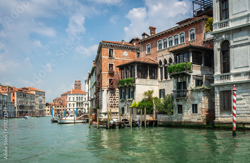 Fototapeta Naklejka Na Ścianę i Meble -  Panorama of Venice. Venetian Canals and gondolas, embankment, bridges, and colorful buildings. Authentic Palazzo. Architecture of an old European city.