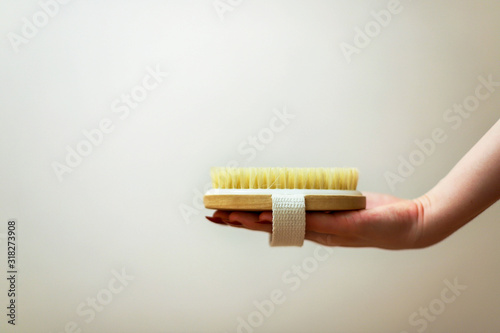 body brush/ dry hand massage on white background