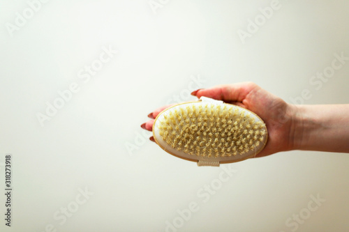 body brush/ dry hand massage on white background