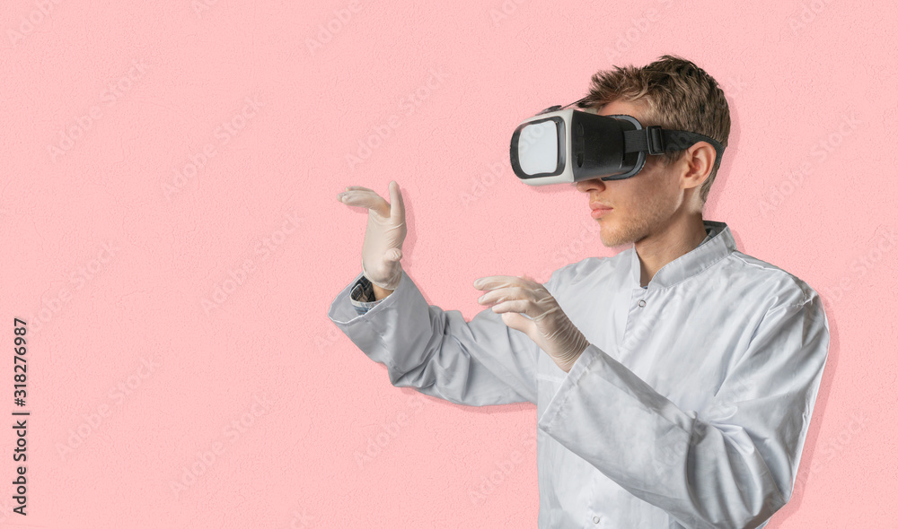 male doctor using the virtual reality VR glasses in medicine industry male doctor using the virtual reality VR glasses in medicine industry