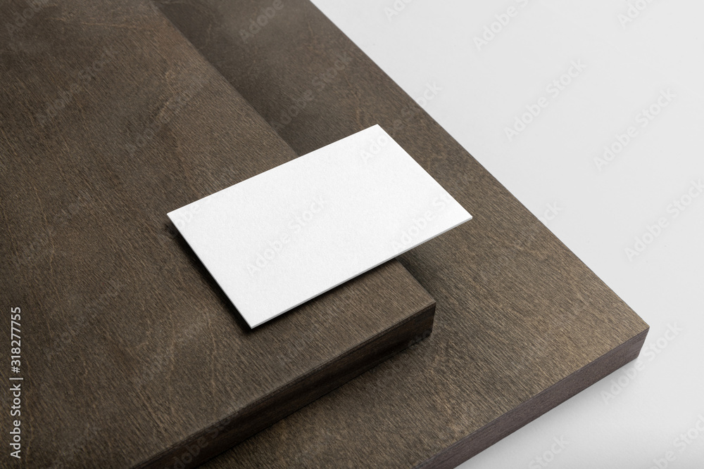 Real photo, stationery branding mockup template, isolated on light grey background with wooden elements to place your design. Real photo, stationery branding mockup template, isolated on light grey background with wooden elements to place your design.