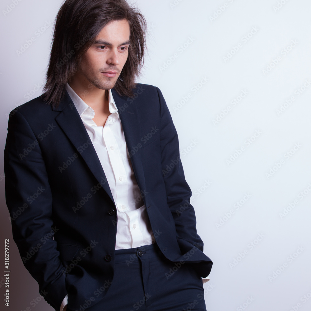 Handsome young elegant man studio portrait. Handsome young elegant man studio portrait.
