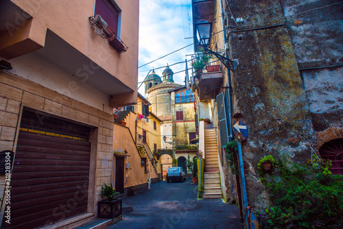 Beautiful Italian street of a small old provincial town © nikitos77