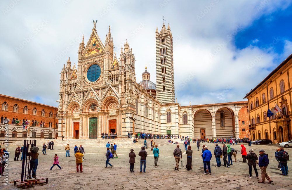 SIENA, ITALY - MAY 05, 2019: Siena Cathedral (Duomo di Siena) medieval church in Siena, Italy, now dedicated to the Assumption of Mary. Siena was founded by Senius and Aschius, two sons of Remus.