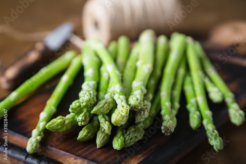 Fresh asparagus on a wooden table