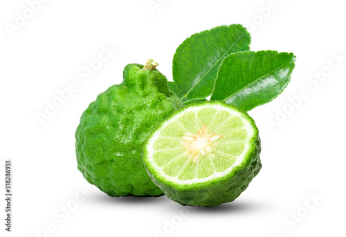Closeup of isolated of one and a half bergamot fruit with leaf on white background.clipping path.