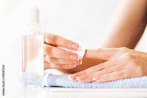 Nails care. Beautiful woman s nails with french manicure  in beauty studio