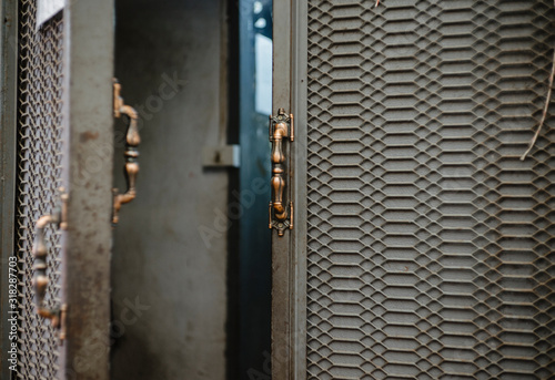 Stainless steel door handle and background photo