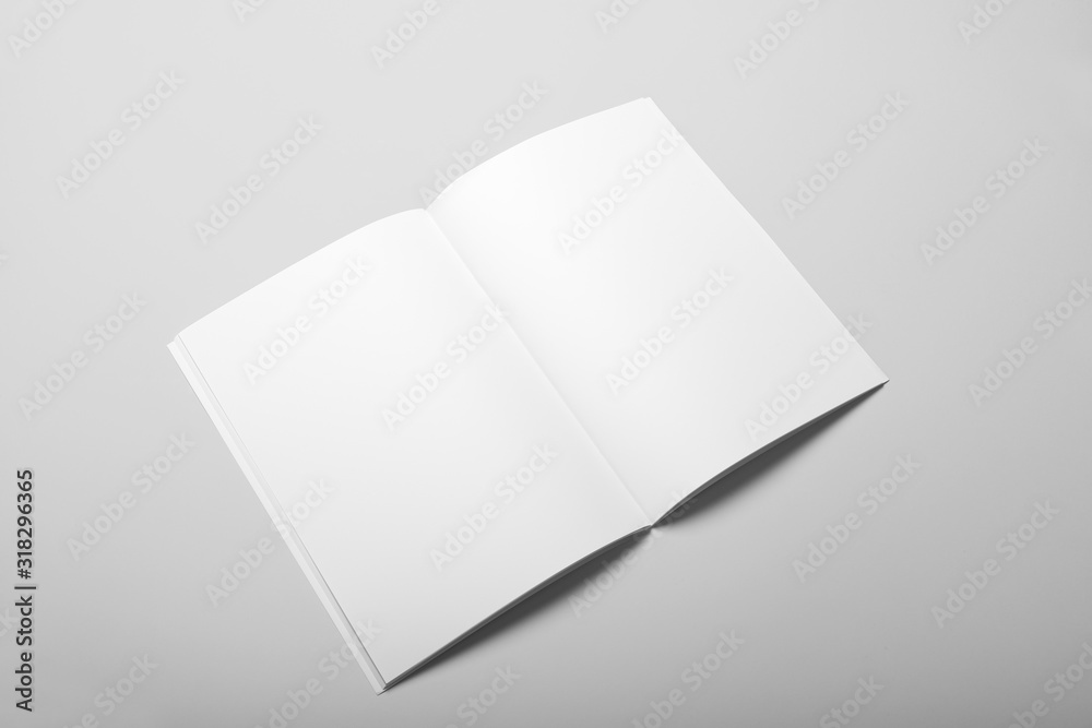 Real photo blank portrait A4, US-Letter, brochure magazine mockup isolated on gray background. Real photo blank portrait A4, US-Letter, brochure magazine mockup isolated on gray background.