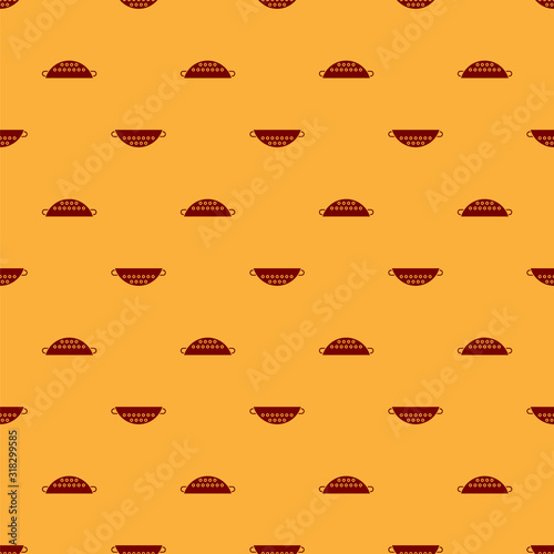 Red Kitchen colander icon isolated seamless pattern on brown background. Cooking utensil. Cutlery sign. Vector Illustration