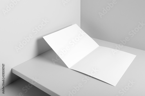Real photo, bi fold letterhead card mockup template, isolated on light grey background to place your design.  © Mockup Cloud