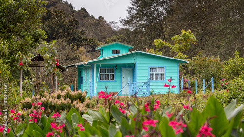 Wooden house in the area of `san Gerardo de Dota, Costa Rica photo